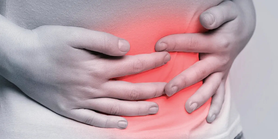 Woman holding stomach