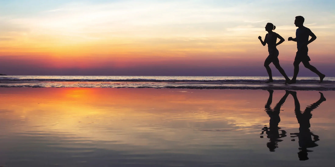 couple running on the beach