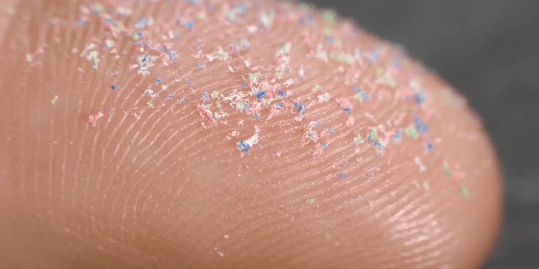 Finger with microplastics