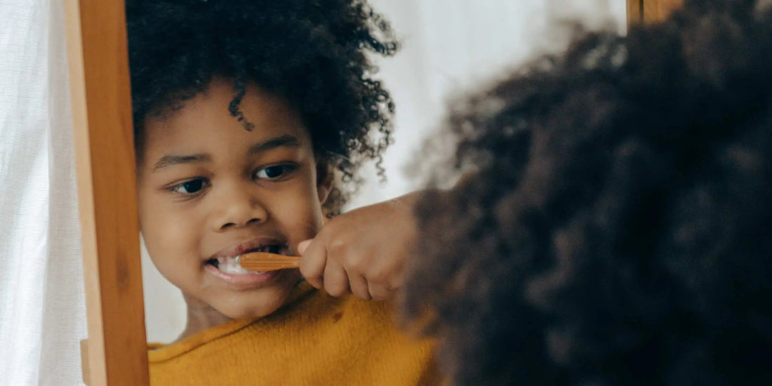 Child brushing teeth