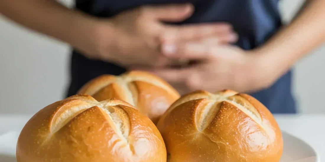 Woman holding stomach and loaves of bread