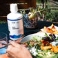 ION Gut Support supplement bottle on a table with meal